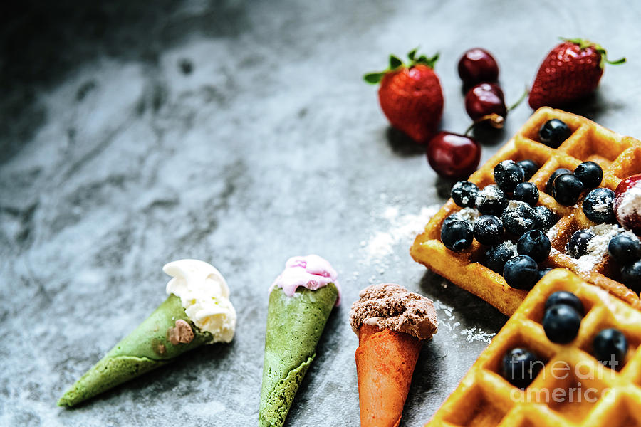 Appetizing ice cream with fruits and waffles, the ideal snack in Photograph by Joaquin Corbalan