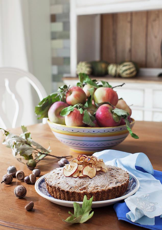 Apple And Almond Cake On An Autumnal Dining Table Photograph by Yelena Strokin