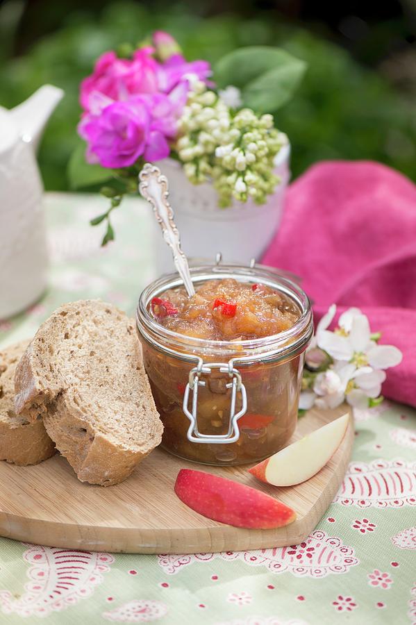Apple And Chilli Chutney In A Glass Photograph by Winfried Heinze