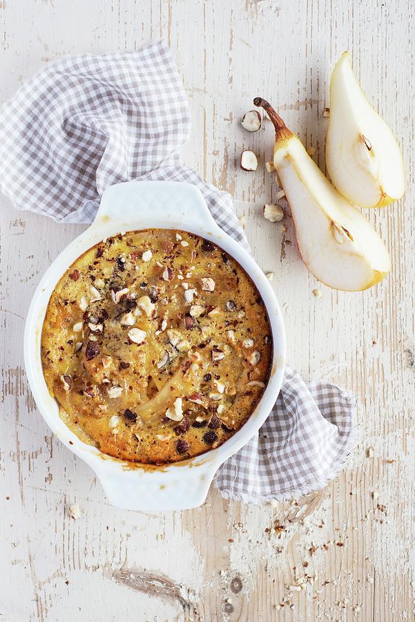 Apple And Pear Gratin In A Baking Dish Photograph by Sonia Chatelain