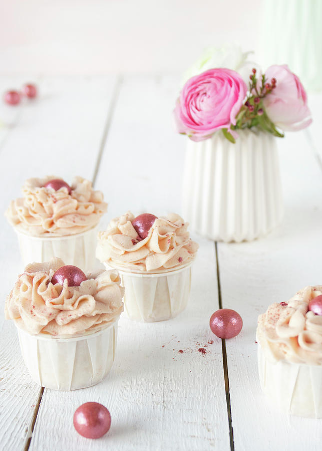 Apple And Raspberry Cupcakes Photograph by Emma Friedrichs