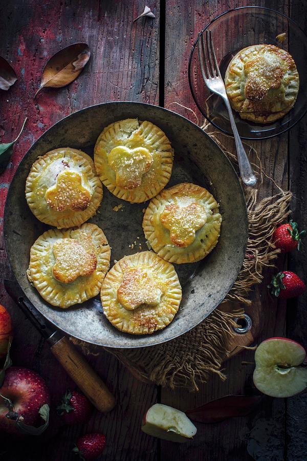 Apple And Strawberry Mini Pies Photograph by Ghosh