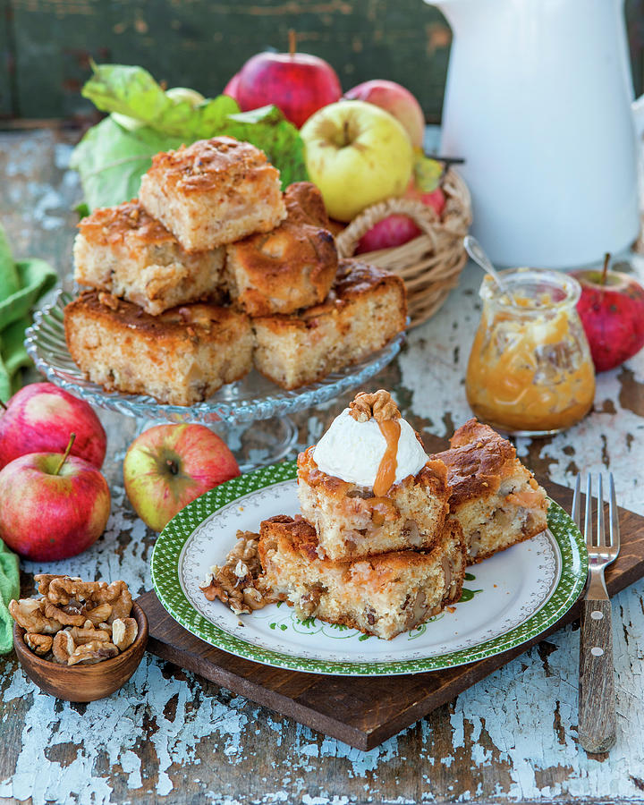 Apple Blondies With Walnuts, Served With Whipped Cream And Caramel Sauce Photograph by Irina Meliukh