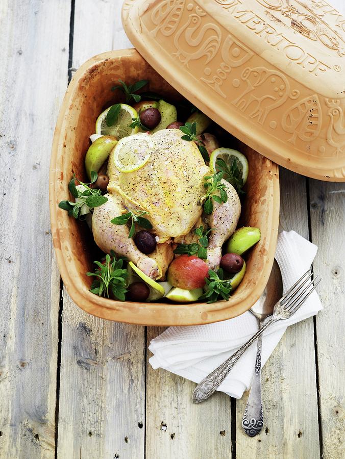 Apple Chicken In A Terracotta Baking Dish Photograph by Mikkel Adsbl