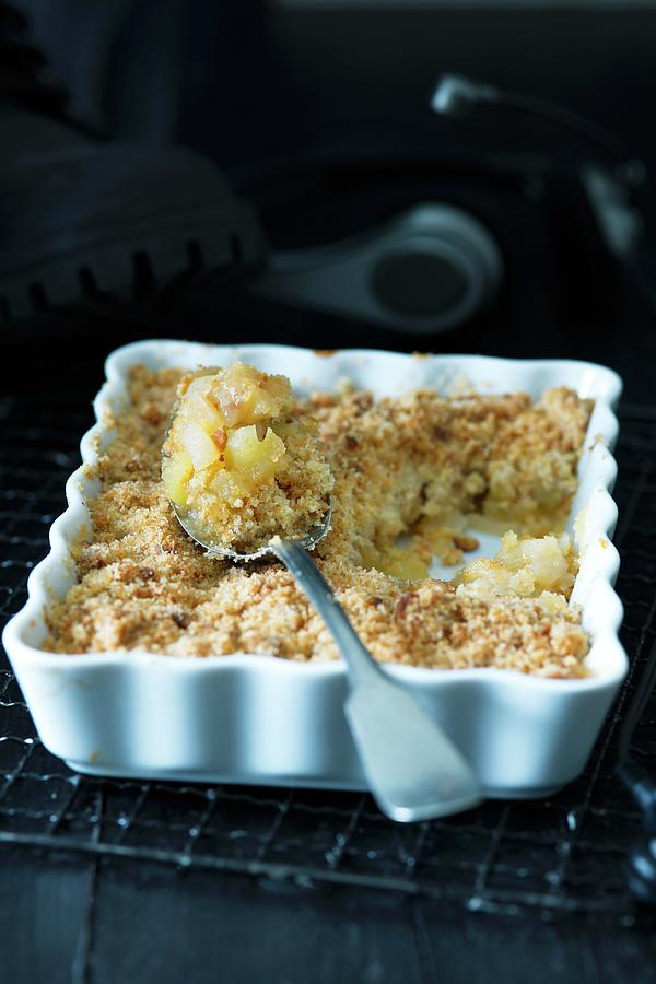 Apple Crumble In A Baking Dish Photograph by Alena Hrbkov