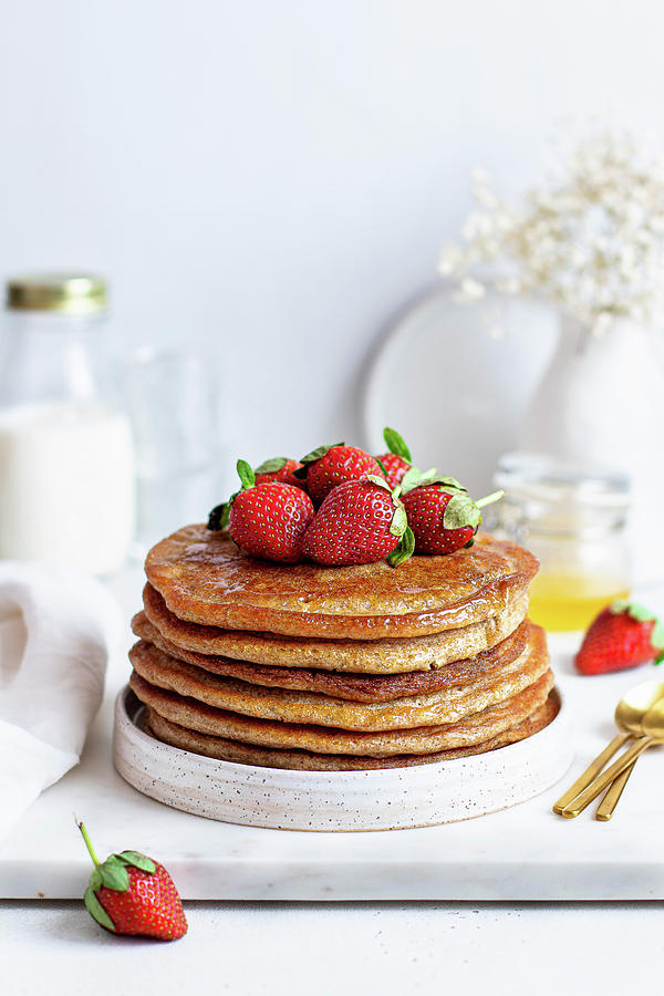 Apple Pancakes With Strawberries Photograph by Yulia Shkultetskaya