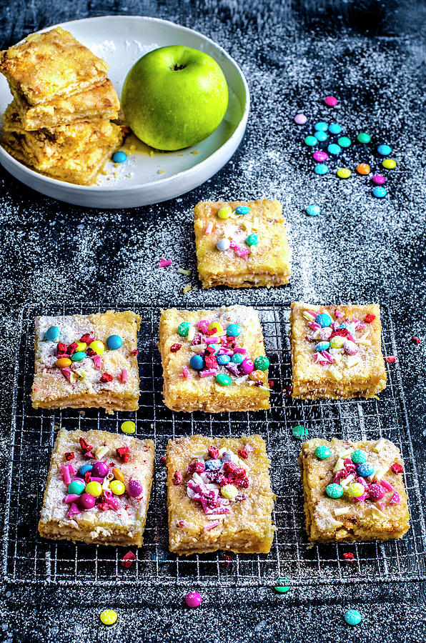 Apple Pie Cut Into Squares, Decorated With Multi-colored Candies Photograph by Gorobina