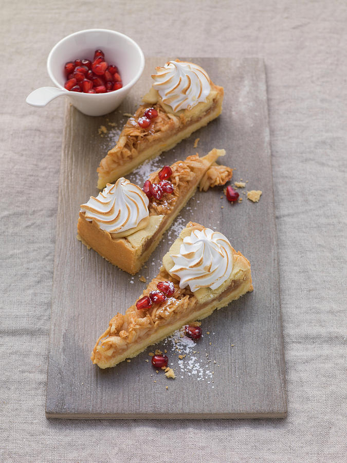 Apple Pie With Topped With Meringue And Pomegranate Seeds Photograph by Eising Studio