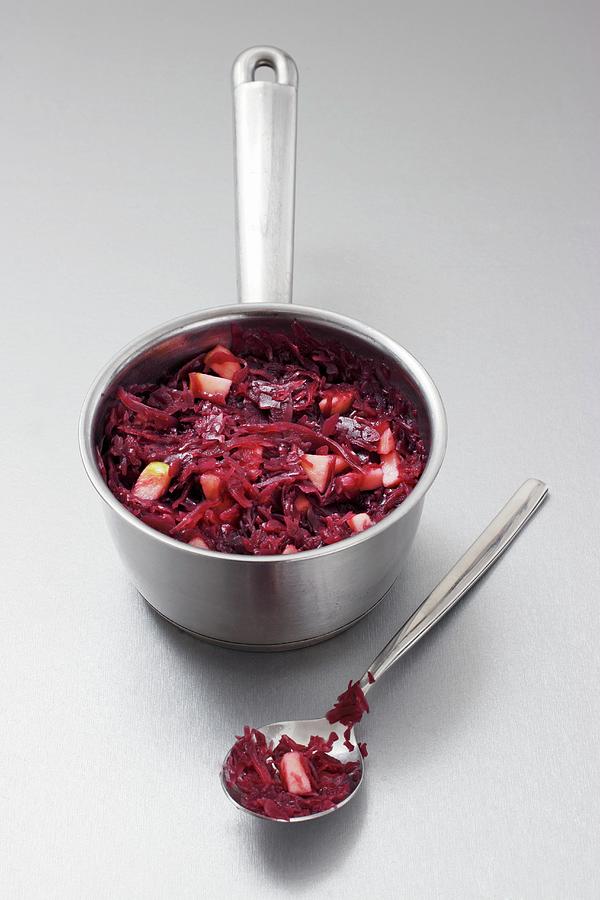 Apple-red Cabbage In A Pan And On A Spoon Photograph by Petr Gross