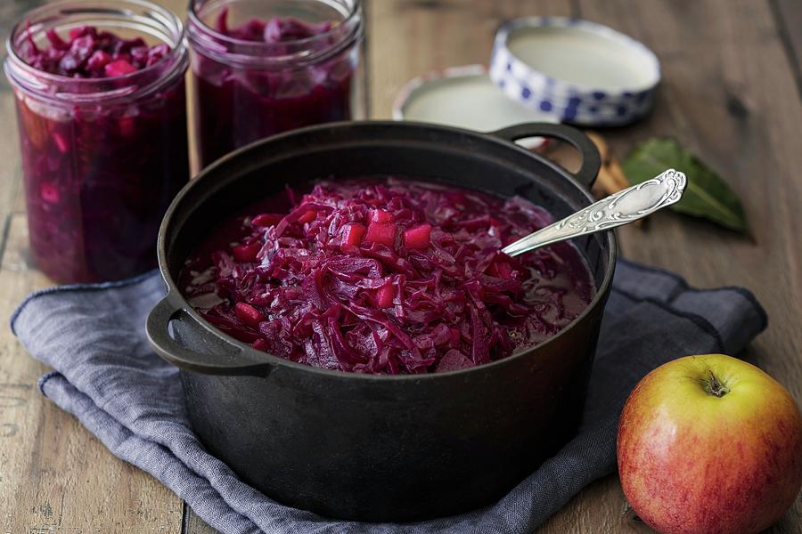 Apple Red Cabbage In A Pot Photograph by Jan Wischnewski