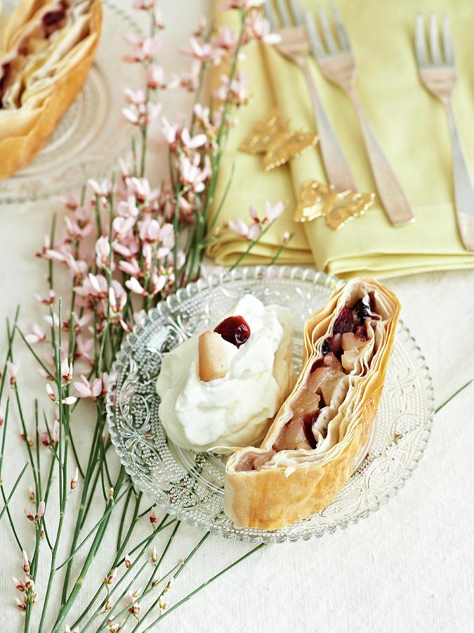 Apple Strudel With Cranberries And Whipped Cream Photograph by Hannah Kompanik