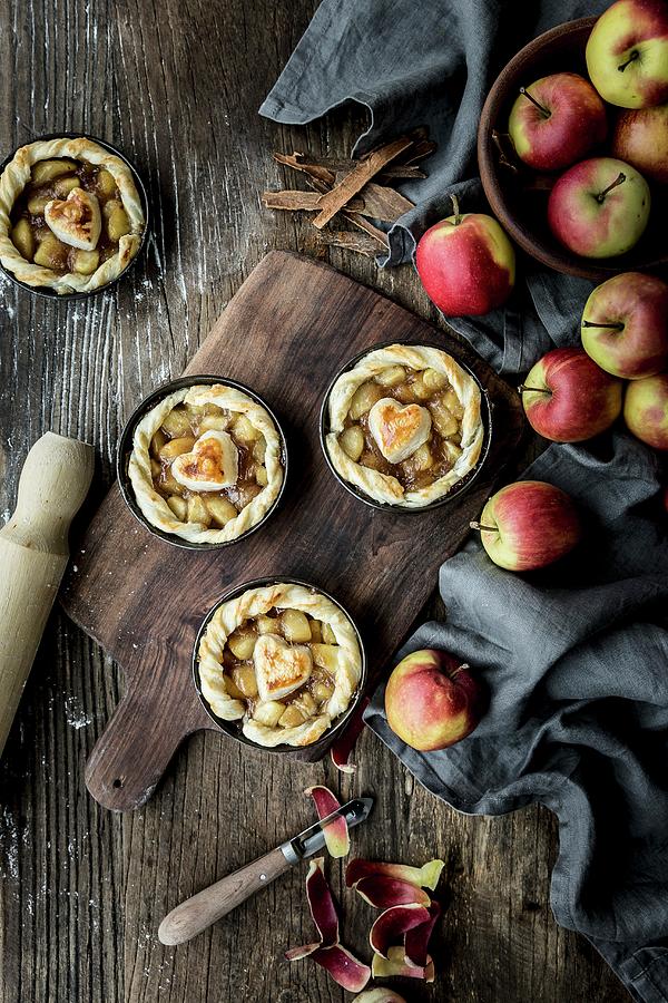 Apple Tartlets Decorated With Hearts Photograph by Sarah Coghill
