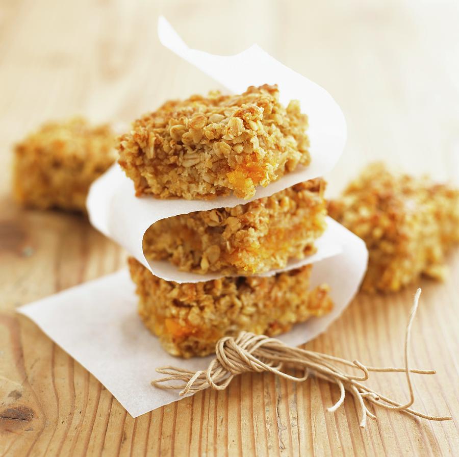 Apricot And Hazelnut Flapjacks, Stacked Photograph by Dave King