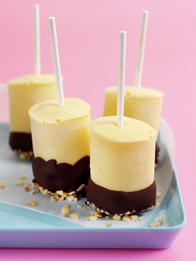 Apricot Ice Lollies With Chocolate Coating Photograph by Garlick, Ian