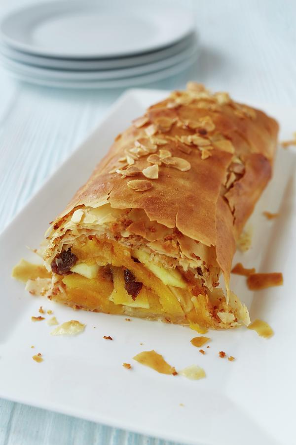 Apricot Strudel With Flaked Almonds Photograph by Clive Streeter