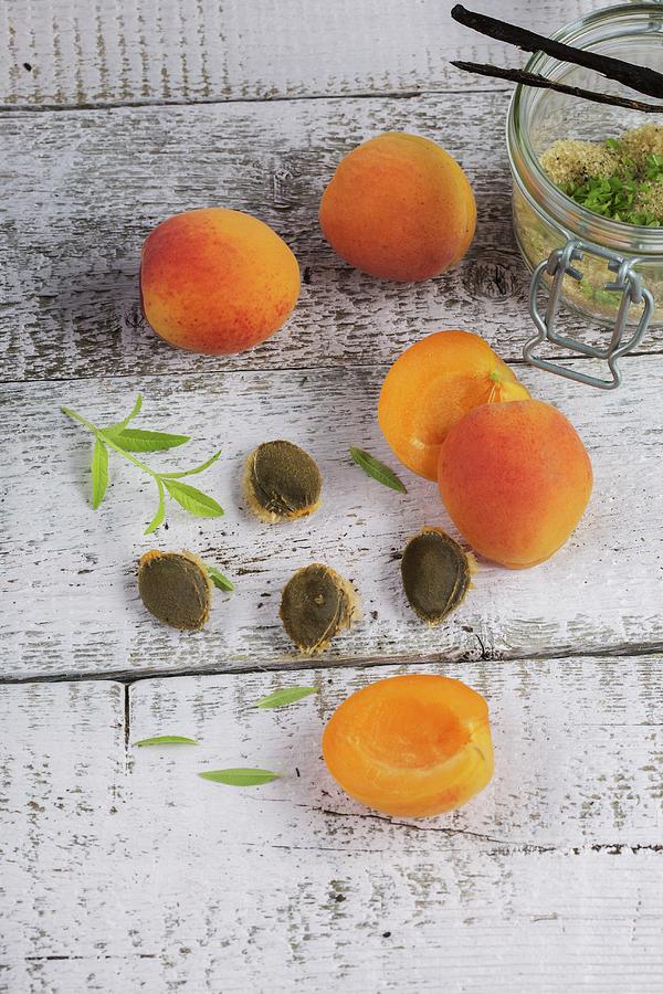 Apricots With Stones And Verbena, Brown Sugar And Vanilla Pods Photograph by Tina Engel