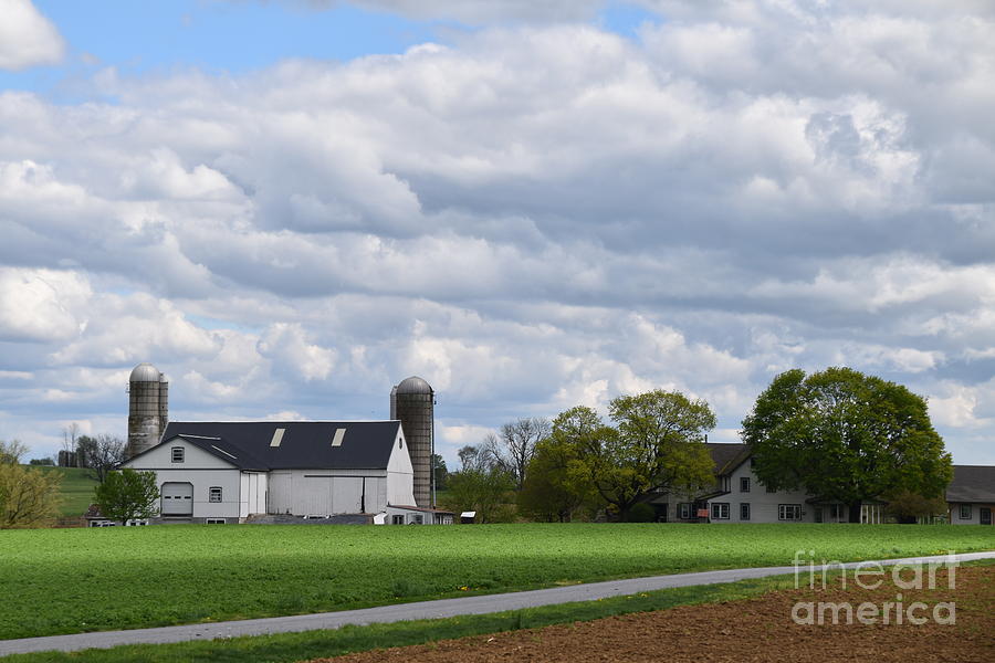 April Clouds on an Amish Farm Photograph by Christine Clark