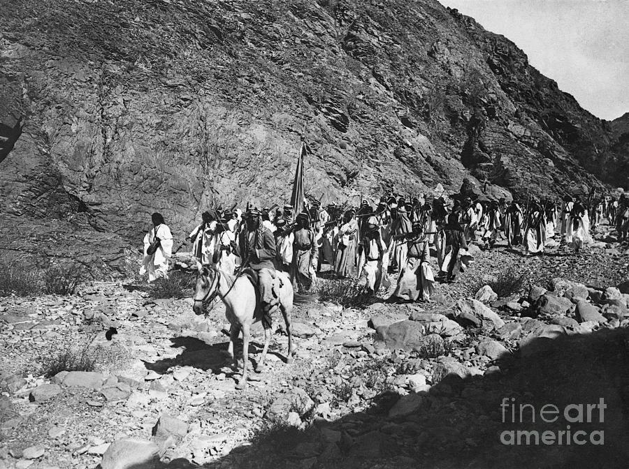 Arabian Soldiers March Through Mountains Photograph by Bettmann