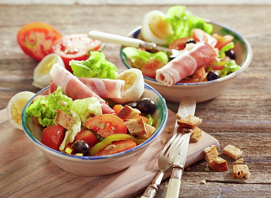 Aragon Salad oak Leaf Lettuce With Tomatoes, Peppers, Egg, Olives And Serrano Ham Photograph by Teubner Foodfoto