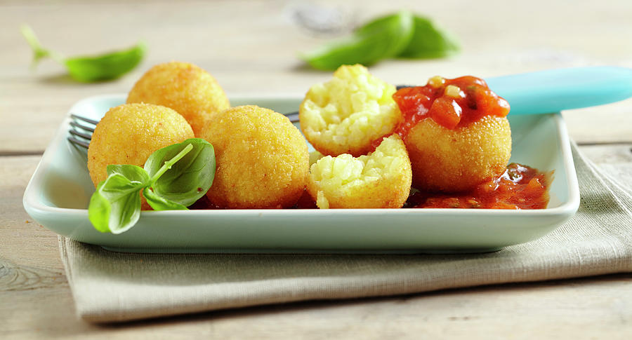 Arancini fried Rice Balls With Tomato Sauce Photograph by Teubner Foodfoto