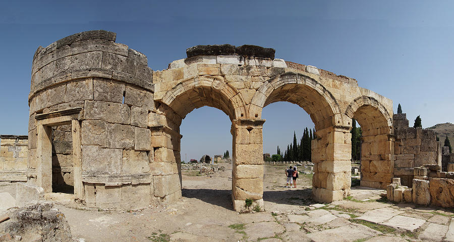 Arch of Domitian, at start of colonnaded street  Photograph by Steve Estvanik