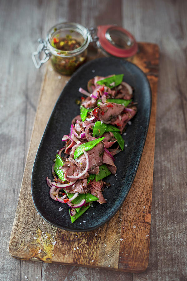 Argentine Roast Beef Salad With Mangetout And Chimichurri Photograph by Jan Wischnewski