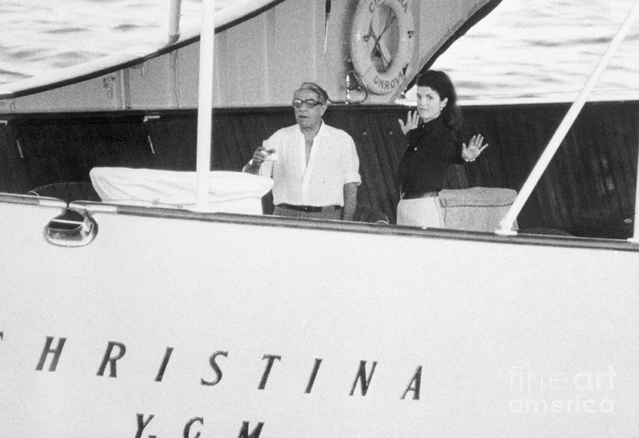 Aristotle Onassis Standing On Ship Deck Photograph by Bettmann