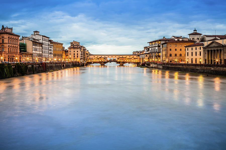 Arno River And Ponte Vecchio Bridge Of Photograph by Giorgiomagini