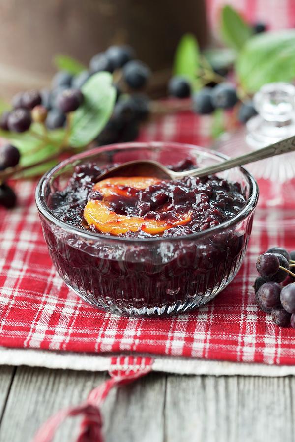 Aronia And Cranberry Jam With Half An Apricot Photograph by Martina Schindler