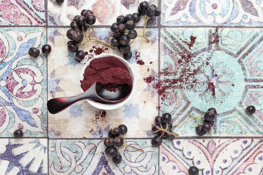 Aronia Berries And Powder Photograph by Mandy Reschke