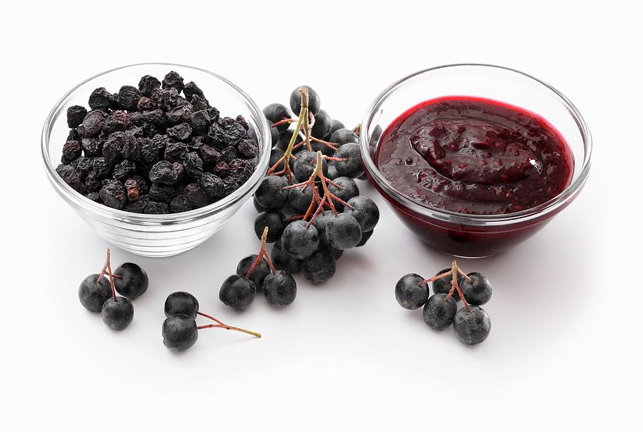 Aronia Jam Next To Fresh And Dried Berries Photograph by Petr Gross