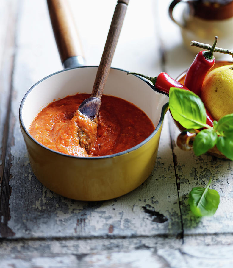 Arrabiata pasta Sauce In A Saucepan Photograph by Karen Thomas