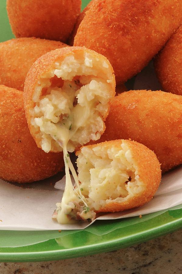 Arrancini Di Riso Filled With Cheese close-up Photograph by John Hay