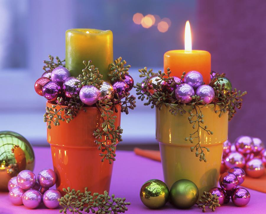 Arrangement Of Candles, Eucalyptus And Christmas Baubles Photograph by Friedrich Strauss