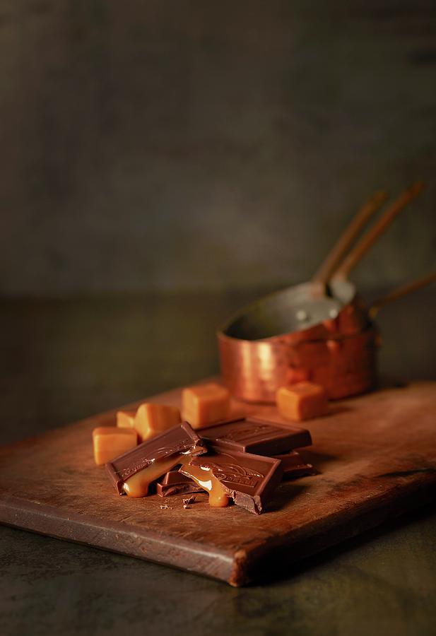 Arrangement Of Caramels And Caramel Chocolate Photograph by Rose Hodges