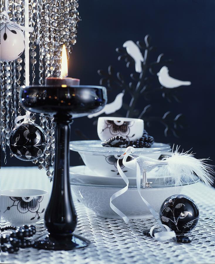 Arrangement Of Crockery, Baubles & Candlestick On Black And White Christmas Table Photograph by Matteo Manduzio