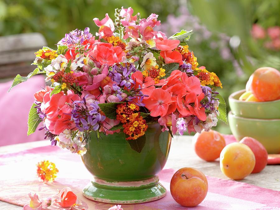 Arrangement Of Late Summer Flowers On Garden Table Photograph by Friedrich Strauss