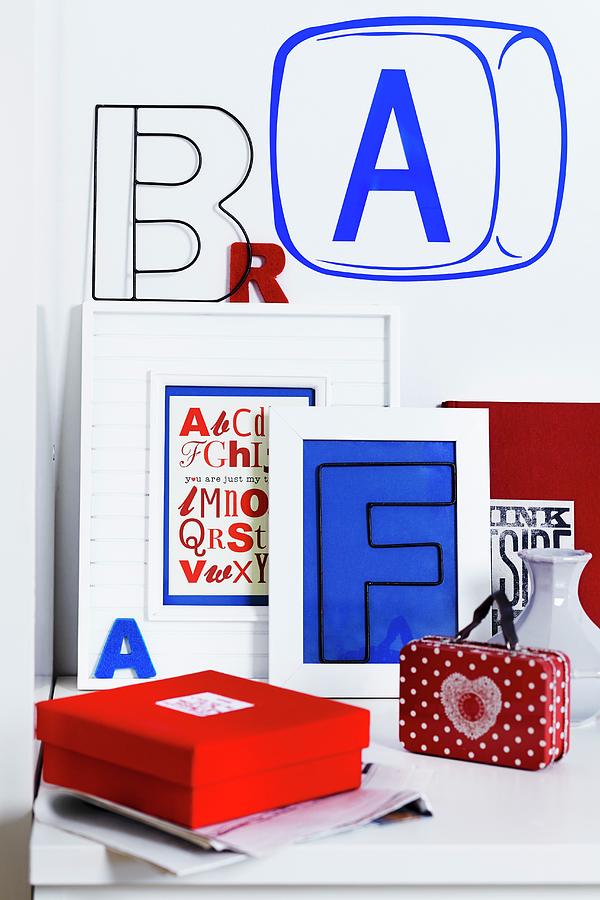 Arrangement Of Letter Ornaments, Framed Letters And Wall Stickers Photograph by Franziska Taube