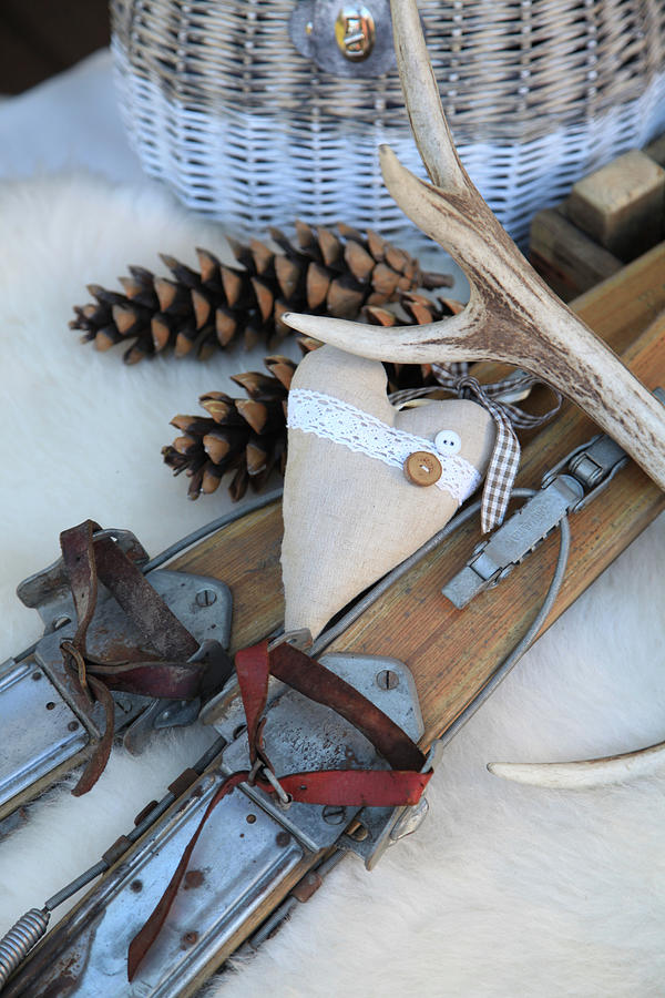 Arrangement Of Old Wooden Skis, Pine Cones, Love Heart And Antlers Photograph by Sonja Zelano