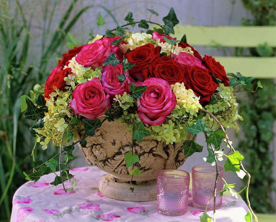 Arrangement Of Roses, Panicle Hydrangea And Trailing Ivy Photograph by Friedrich Strauss