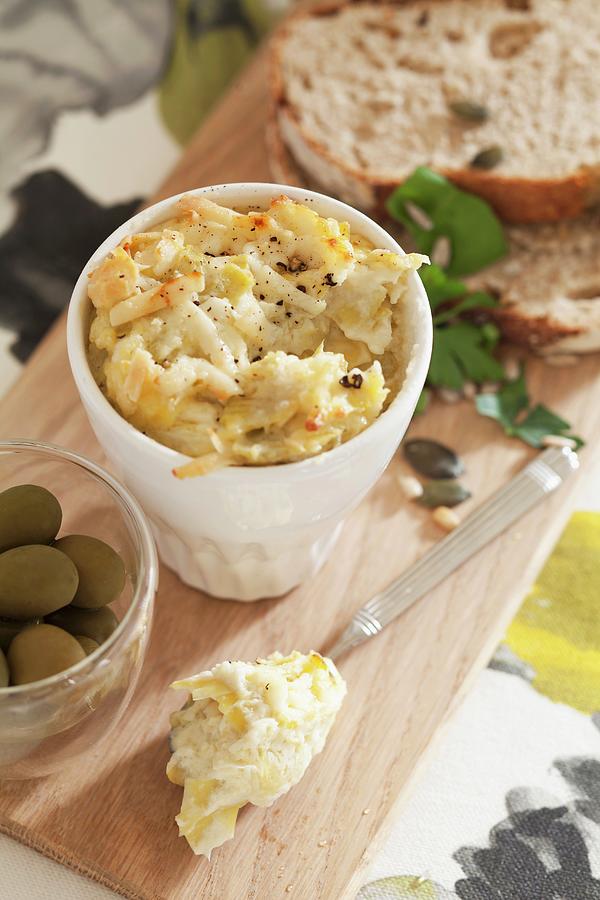 Artichoke Paste With Parmesan, Mayonnaise And Sour Cream Served With Olives And Bread Photograph by Great Stock!
