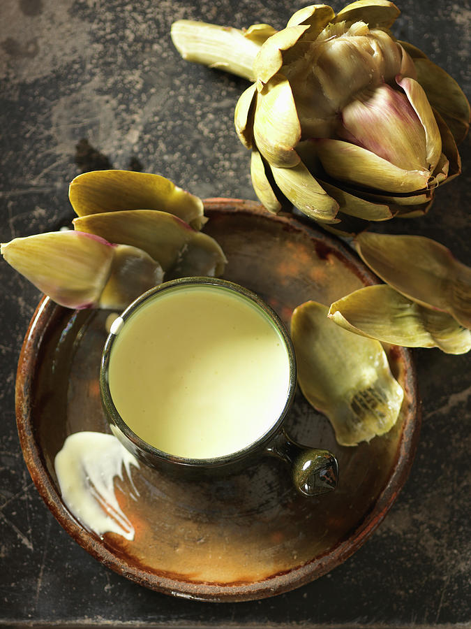 Artichoke With Aioli Photograph by Andreas Thumm