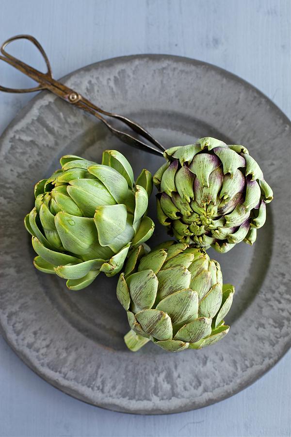 Artichokes Photograph by Ingwervanille