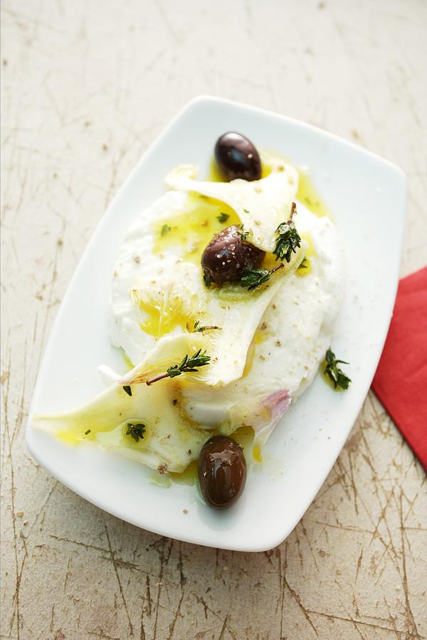 Artichoke Photograph - Artichokes With Goats Cheese, Olive Oil And Olives by Michael Wissing