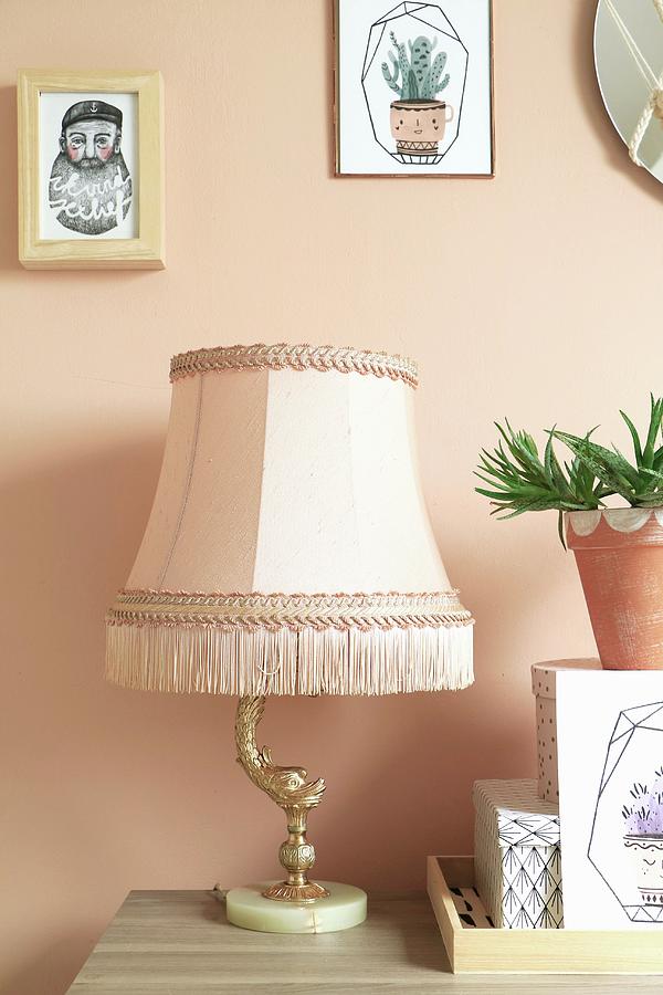 Artistic Table Lamp With Traditional Lampshade Next To Succulent In Terracotta Pot Arranged On Top Of Decorative Boxes Photograph by Marij Hessel