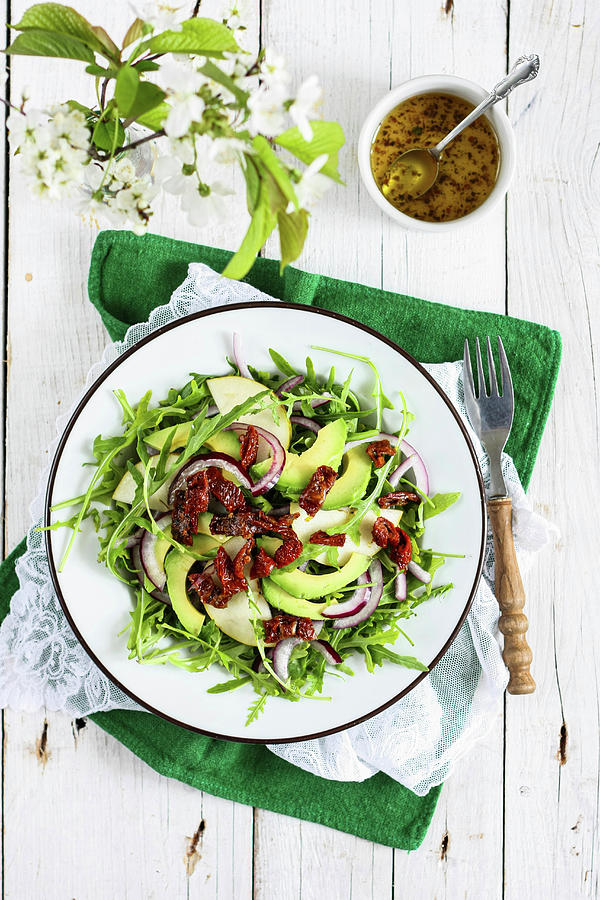Arugula Salad With Pears And Avocado Photograph by Karolina Nicpon