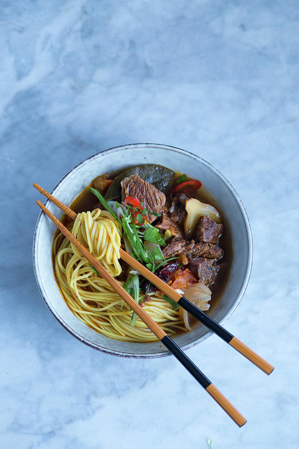 Asian Noodle Soup With Beef And Vegetables Photograph by Eising Studio