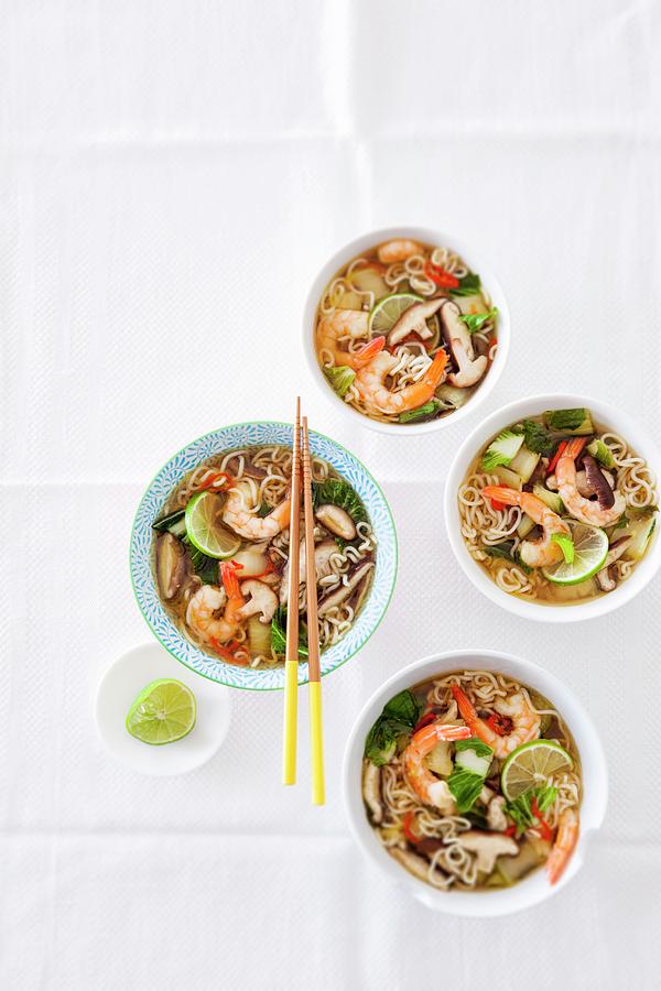 Asian Noodle Soup With Shiitake And Shrimp Photograph by Peter Kooijman