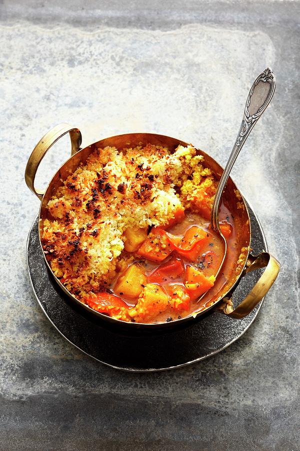 Asian Sweet Potato Curry With Pineapple, Tomato And A Coconut Crust Photograph by Jalag / Mathias Neubauer