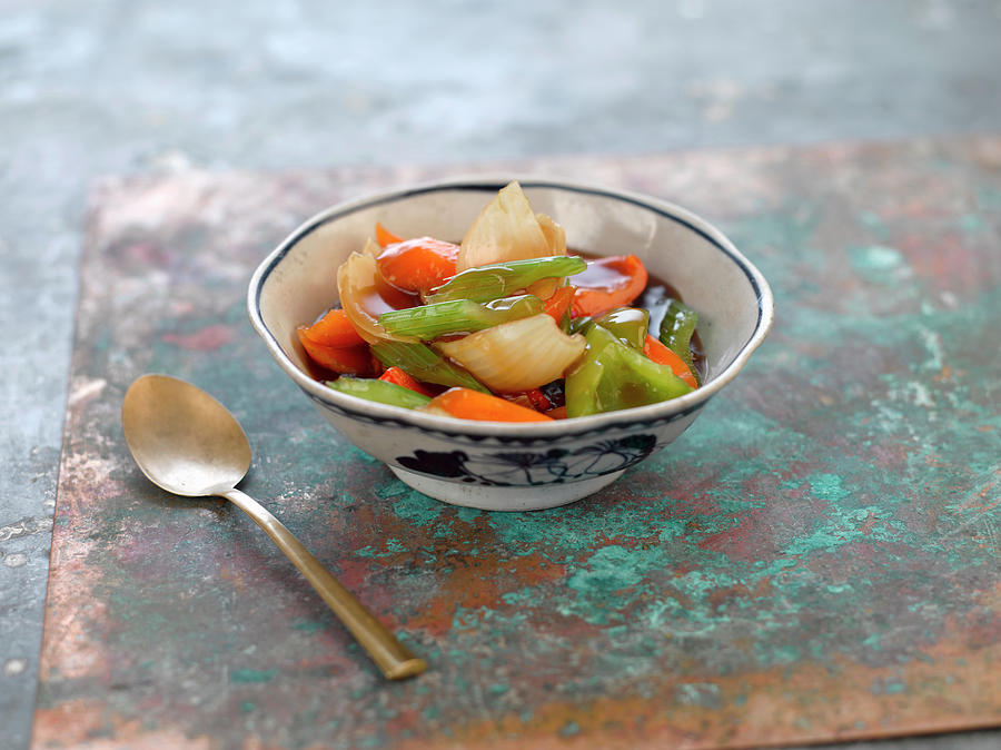 Asian Vegetable With Sweet And Sour Sauce Photograph by Ian Garlick
